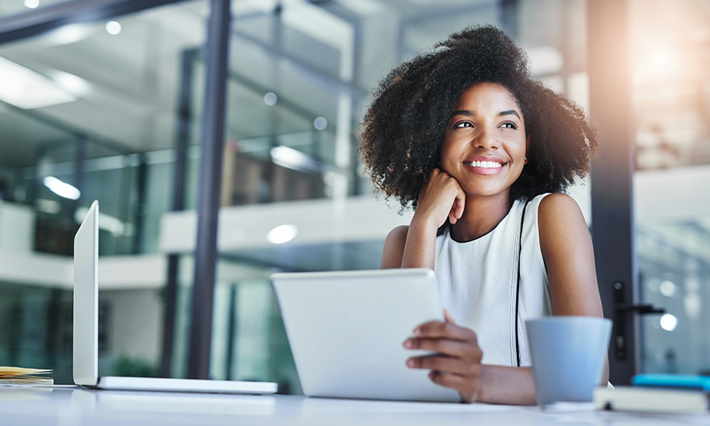 ideaweavers-happy-woman-working-on-computer-main